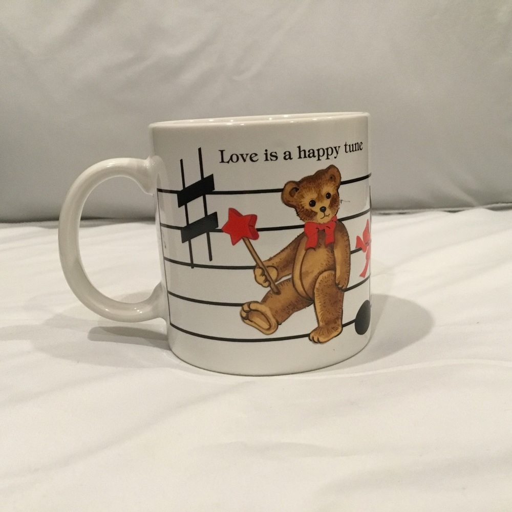 Coffee mug. Teddy Bear Musical themed. “Love is a happy tune”